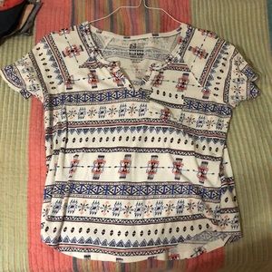 A tee shirt with a V cut